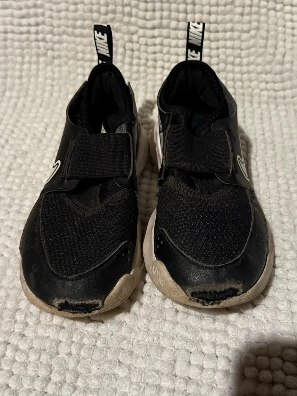 Nike Kids Black Slip-On Sneakers with White Swoosh